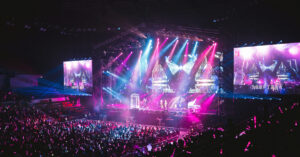 Music concert laser light show pink crowd