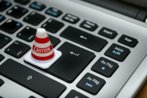 keyboard with a caution cone on it.