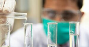 scientist working on test tubes