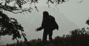 man hiking in the wilderness