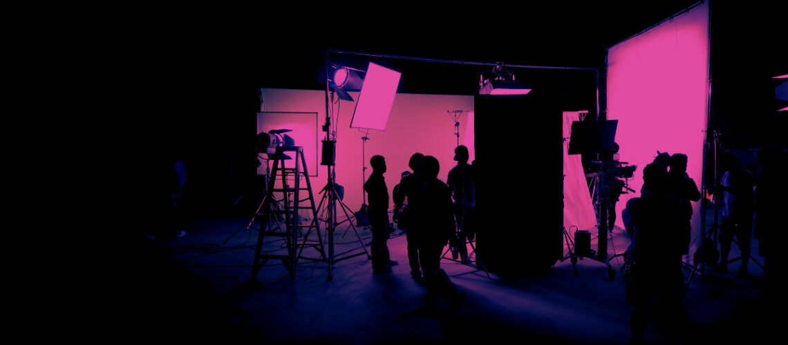 Film crew on the set of a movie using green technology.