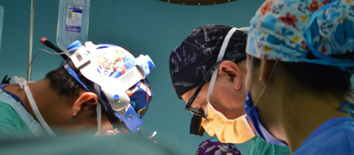 doctors performing surgery