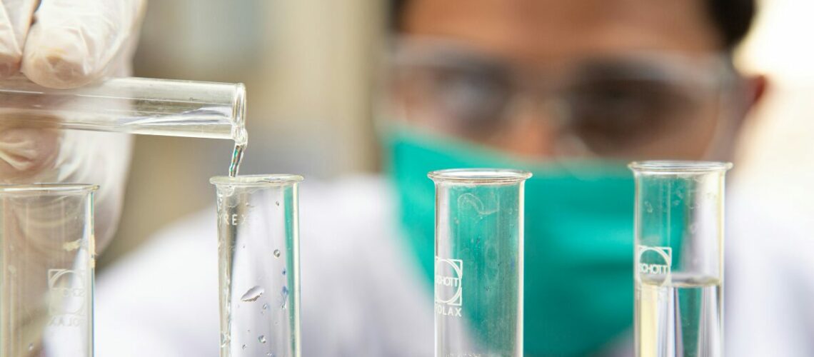 scientist working on test tubes