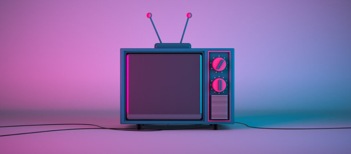 Old fashion television under blue and purple lights.